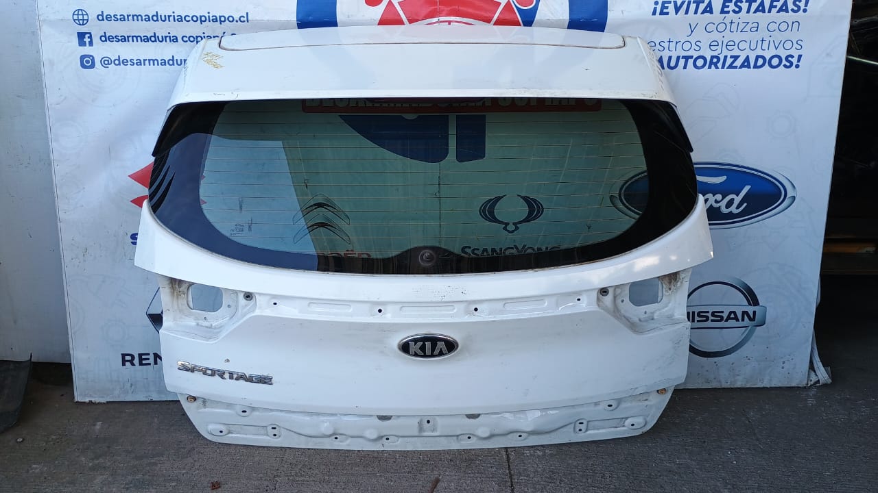 Tapa maleta / portalon kia sportage