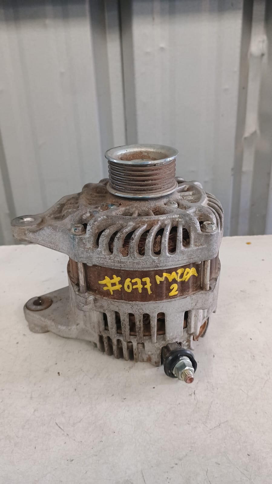 Alternador mazda 2