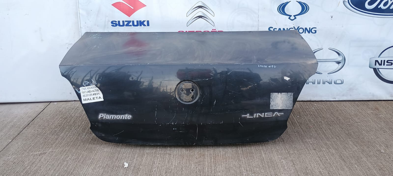 Tapa maleta / portalon fiat linea