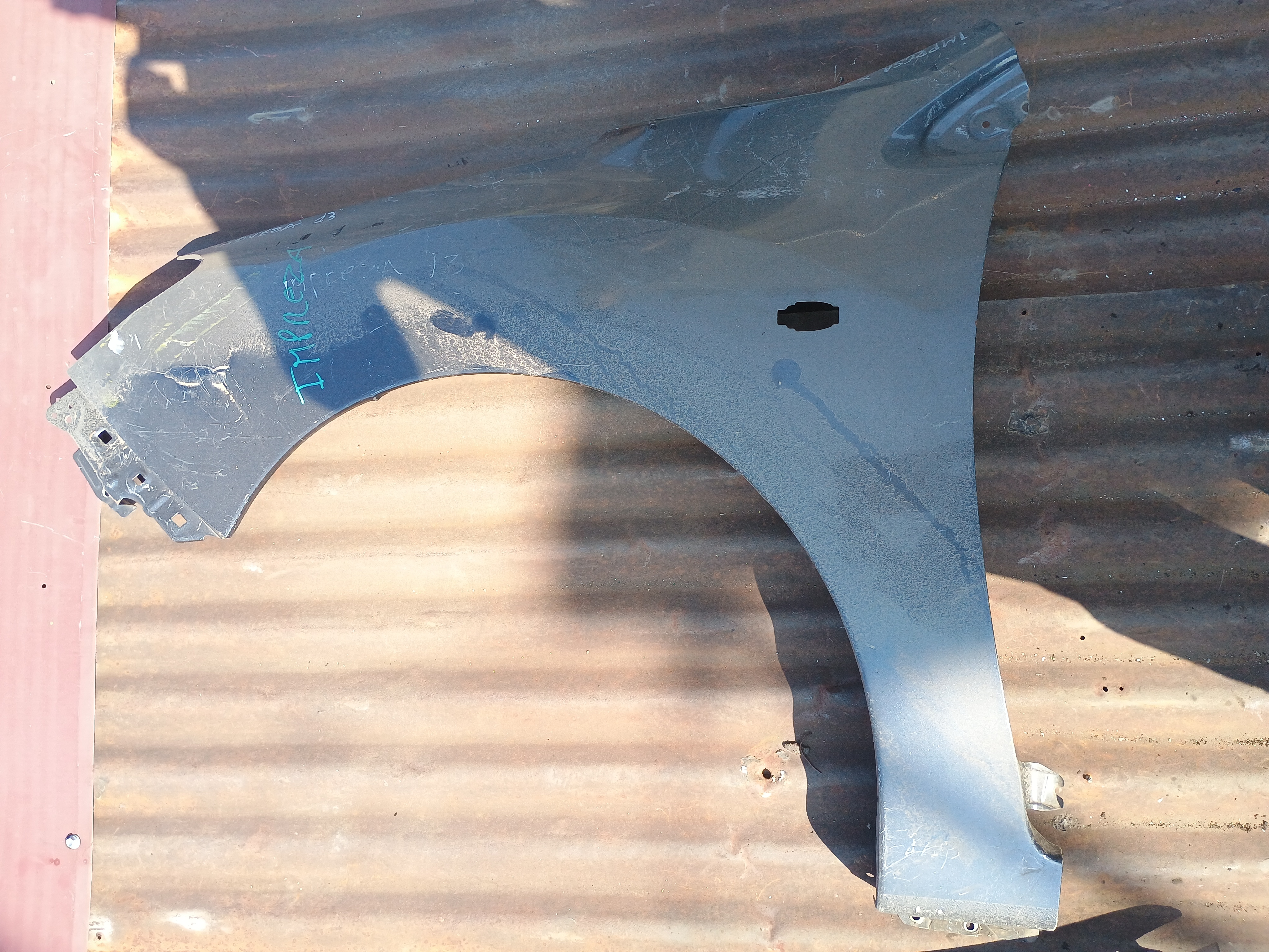 Tapabarro izquierdo subaru impreza