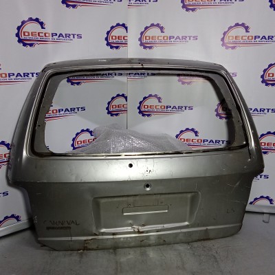 Tapa maleta / portalon kia carnival 2000 2001 2002 2003 2004